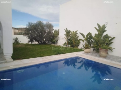 Villa avec jardin et piscine à vendre à Hammamet Sud51355351