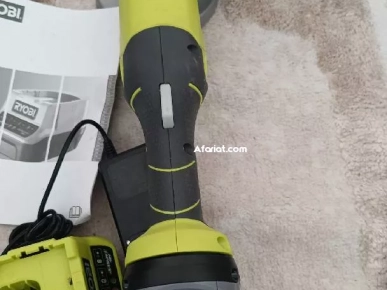 meuleuse électrique Ryobi original avec visseuse électrique Ryobi