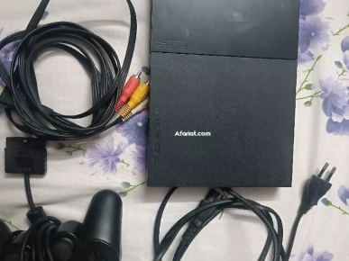 PS2 a vendre en très bon état avec 20jeux tel 94617114