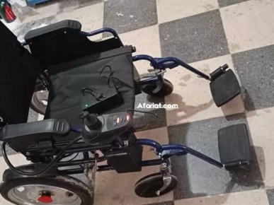 fauteuil roulant électrique presque neuf