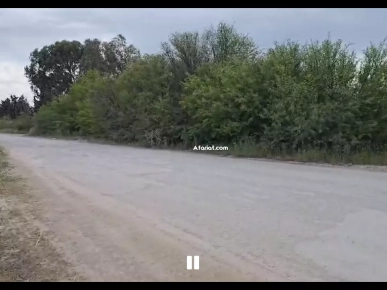 Un terrain de 1000m2 sur la route principale sidi younes