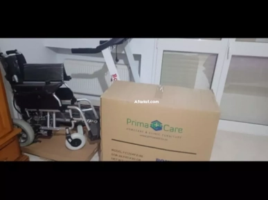 Chaise roulante electrique