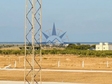 "Terrain avec vue sur la mer".