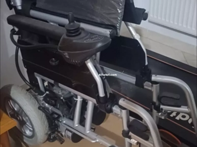 Chaise roulante electrique