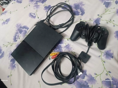 PS2 a vendre en très bon état avec 20jeux tel 94617114