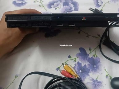 PS2 a vendre en très bon état avec 20jeux tel 94617114