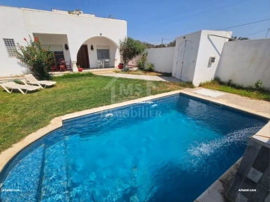 Villa avec piscine et jardin à Hammamet Sud à vendre 51355351