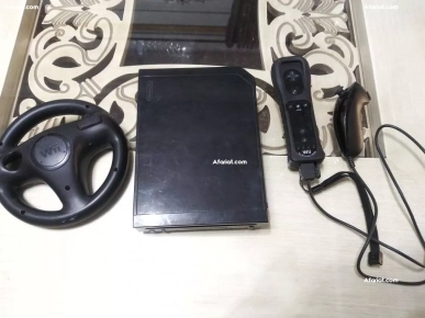 Nintendo Wii (console de jeux) Nintendo Wii (console de jeux)