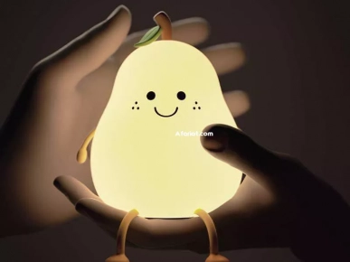 Veilleuse  rechargeable usb en silicone  forme de poire souriante