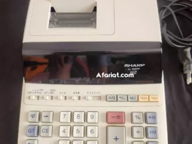 machine a calculer SHARP avec ruban etat neuf