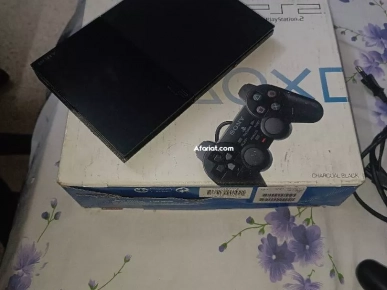 PS2 a vendre en très bon état avec 20jeux tel 94617114