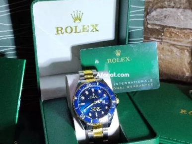 ROLEX submariner Gold¢black avec packaging