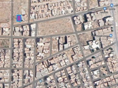 Terrain à Kairouan avec titre bleu