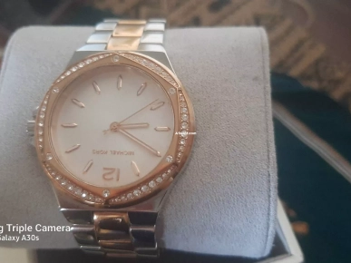 montre MK bonne état