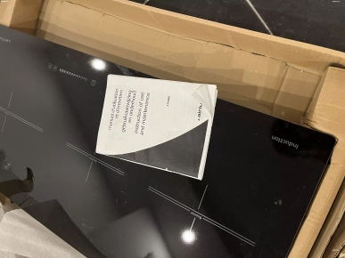 Très belle plaque à induction neuve Très belle plaque à induction neuve