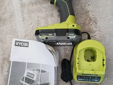 meuleuse électrique Ryobi original avec visseuse électrique Ryobi