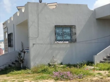 terrain agricole contenant une villa