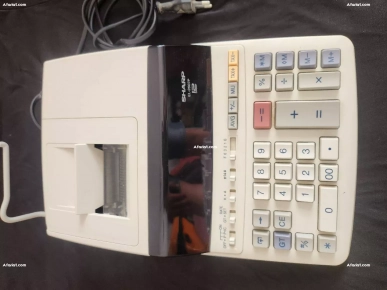 machine a calculer SHARP avec ruban etat neuf