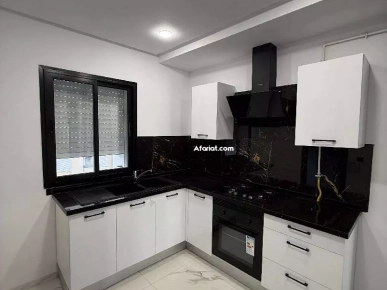 appartement S plus deux récemment construit avec parking ss sol