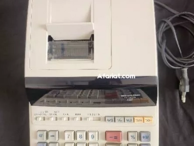 machine a calculer SHARP avec ruban etat neuf