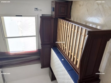 chambre à coucher en bois merisier