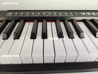 Piano a clavier 61 touches durable avec écran..