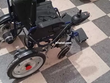 fauteuil roulant électrique presque neuf