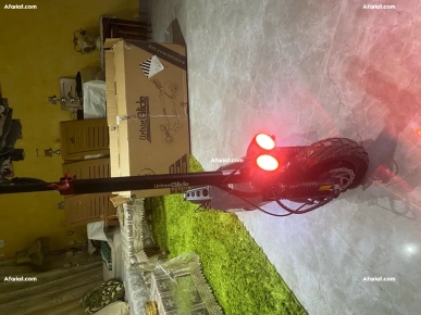 trottinette électrique E cross max 2X2  urban glide