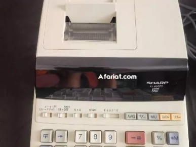 machine a calculer SHARP avec ruban etat neuf