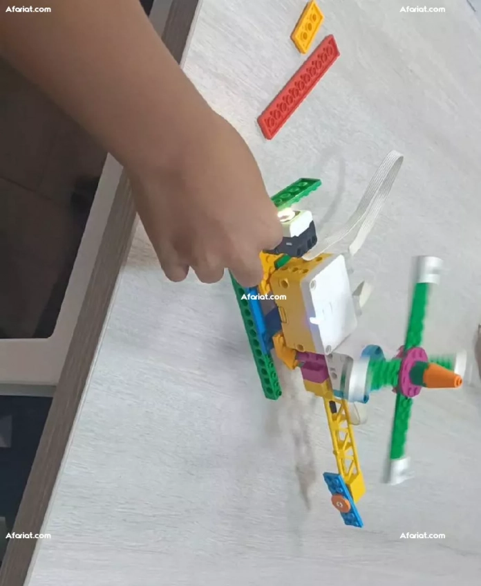 Éducatrice expérimentée en robotique et programmation