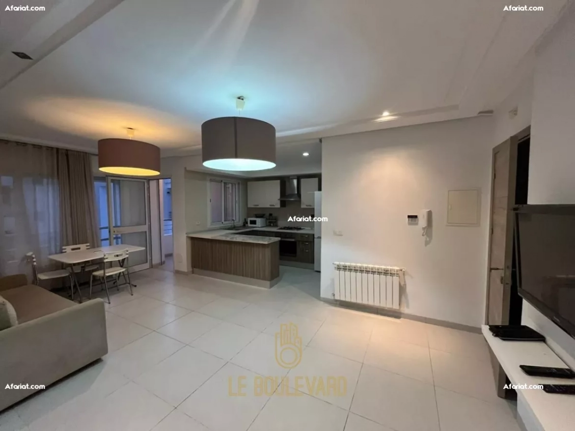 A Vendre Appartement S+1 de Luxe avec Vue Piscine à Cité El Wafa