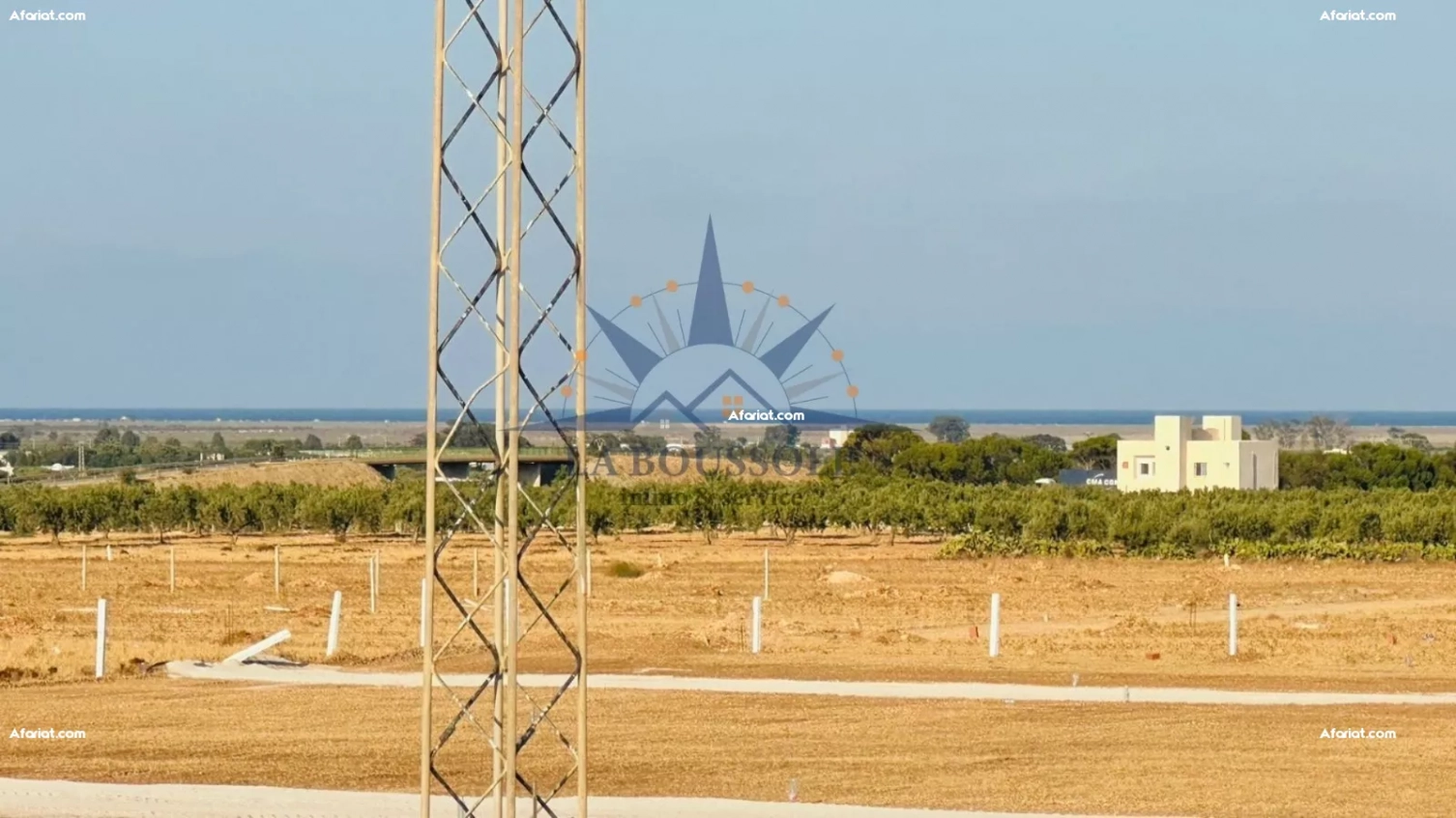 "Terrain avec vue sur la mer".