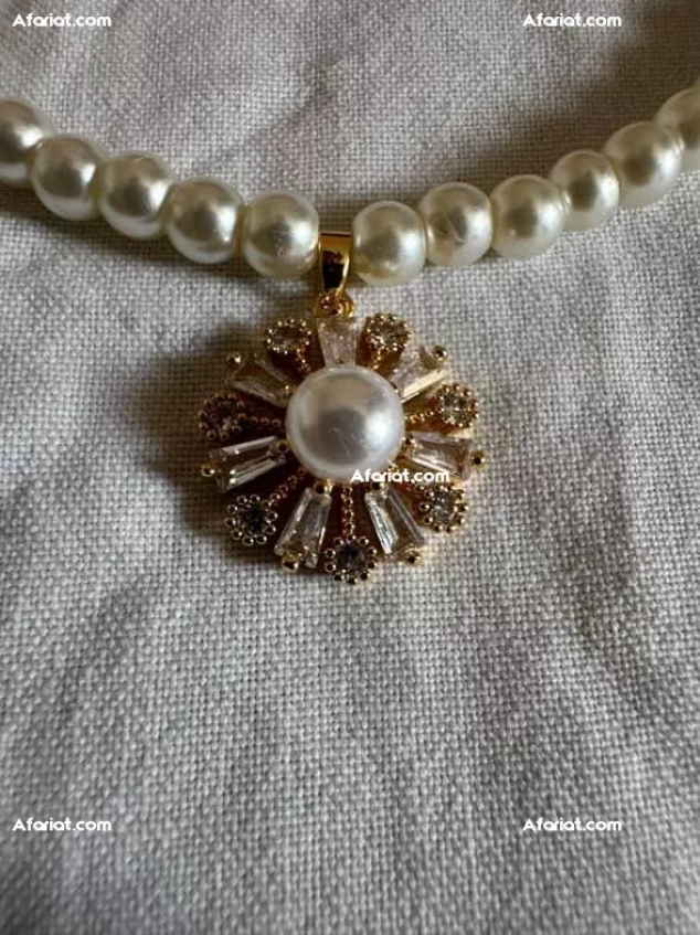 Collier en acier inoxydable avec des perles de bonne qualité 