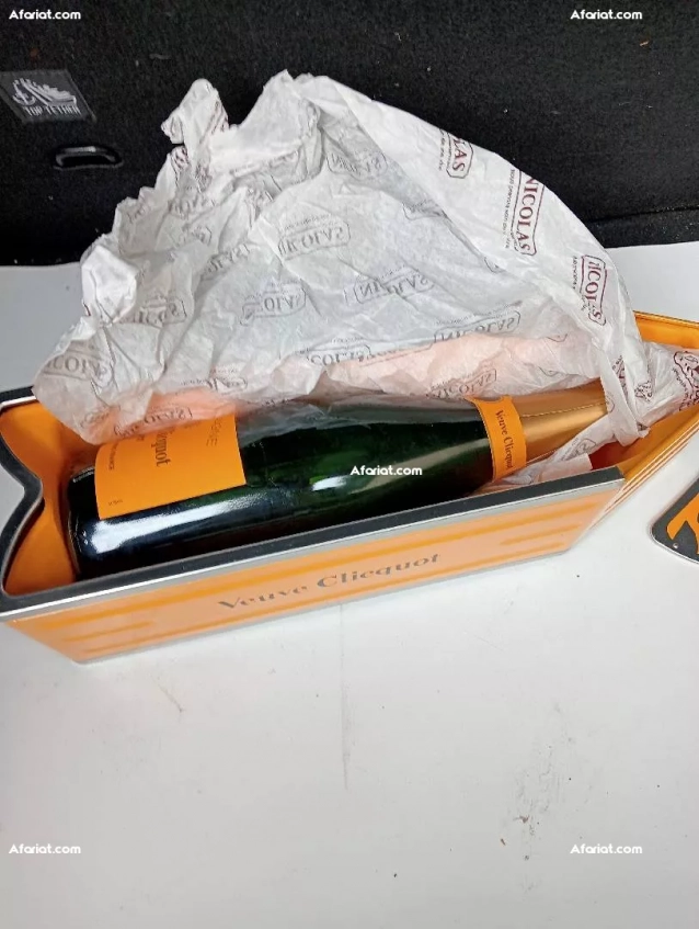 vente une bouteille de champagne