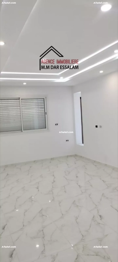 maison style américain près de la mer