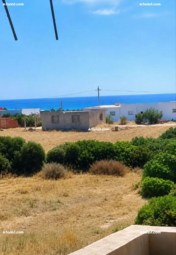 maison R1 près de la mer